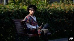 Peruvian singer Lenin Tamayo takes a break from recording a music video in Lima, Peru, Aug. 3, 2023. With his fusion of K-pop and Andean culture, the composer is known as the inventor of Quechua pop — Q-pop — writing songs in Spanish and Quechua.