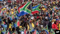 South Africans cheer ahead of the inauguration of Cyril Ramaphosa as president at the Union Buildings South Lawns in Pretoria, South Africa, on June 19, 2024.