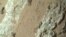 This handout image obtained on July 26, 2024, courtesy of NASA/JPL-Caltech/MSSS shows a reddish rock nicknamed "Cheyava Falls" in Mars' Jezero Crater on July 18, 2024, in an image captured by NASA's Perseverance rover. 