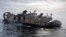 In this image provided by the U.S. Navy, sailors operate landing craft air cushions (LCAC) during recovery efforts of debris from a Chinese high altitude balloon in the Atlantic Ocean on Feb. 8, 2023. (Eric Moser/U.S. Navy via AP)