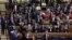 Members of the Socialist parliamentary group applaud at the end of a plenary session of Spain's legislature during which an amnesty bill that exonerates figures linked to Catalonia's 2017 failed secession bid was approved, in Madrid, March 14, 2024.