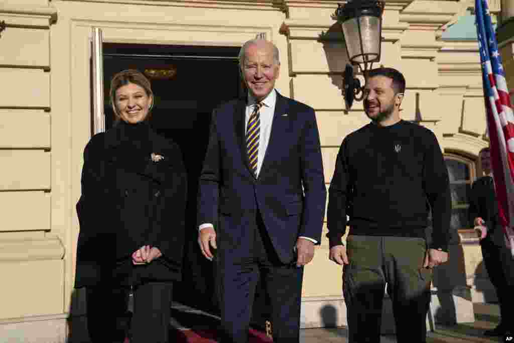 U.S. President Joe Biden, center, meets with Ukrainian President Volodymyr Zelenskyy, right, and Olena Zelenska, left, spouse of President Zelenskyy, at Mariinsky Palace in Kyiv, Feb. 20, 2023.