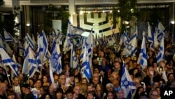 Israelis protesting Prime Minister Benjamin Netanyahu's government plans to overhaul the judicial system hold an alternative Independence Day observance in Tel Aviv, Israel, April 25, 2023.
