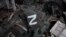 The Z letter, a tactical insignia of Russian troops in Ukraine, is seen on a captured Russian battle tank to be refurbished at a workshop in Ukraine's Kharkiv region, Feb. 20, 2023.