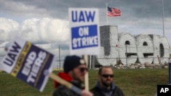 Striking UAW workers picket at the Jeep Assembly Plant on Oct. 9, 2023 in Toledo, Ohio. 