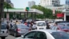 Nigerians Queue As Government Fuel Subsidy Scrapped