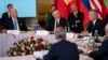 President Joe Biden, Polish President Andrzej Duda and others, listen as NATO Secretary General Jens Stoltenberg speaks during a meeting with the leaders of the Bucharest Nine, a group of countries on the eastern flank of NATO, in Warsaw, Feb. 22, 2023. 