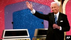 FILE - Game show host Bob Barker waves goodbye as he tapes his final episode of "The Price Is Right," in Los Angeles, California, June 6, 2007. 