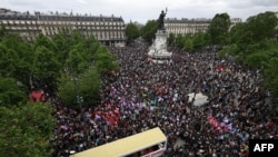 Protesters gather in Paris during an anti far-right rally after French president called legislative elections following far-right parties' gains in European Parliament elections, June 15, 2024. 