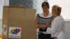 Venezuelans vote in highly charged election amid fraud worries