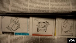 Only a handful of newspapers feature cartoons unlike what used to be a common phenomenon prior to 2019. (Wasim Nabi/VOA)