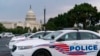 FILE - Washington Metropolitan Police Department vehicles are pictured on the perimeter of the Capitol, Aug. 26, 2021. 