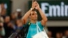 Spain's Rafael Nadal waves as he leaves the court after losing against Germany's Alexander Zverev during their first round match of the French Open tennis tournament at the Roland Garros stadium in Paris, May 27, 2024. 