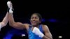 Refugee Olympic Team's Cindy Ngamba celebrates after defeating Canada's Tammara Thibeault in the women's 75 kg preliminary boxing match at the 2024 Summer Olympics, in Paris, France, July 31, 2024.