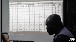 Results are displayed on a screen during the collation of the presidential election results at the Independent National Electoral Commission (INEC) headquarters in Yaba, in the suburbs of Lagos, in Nigeria, Feb. 26, 2023. 