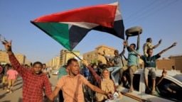 Protesters march during a rally marking the fourth anniversary of the April uprising, in Khartoum, Sudan, April 6, 2023. 