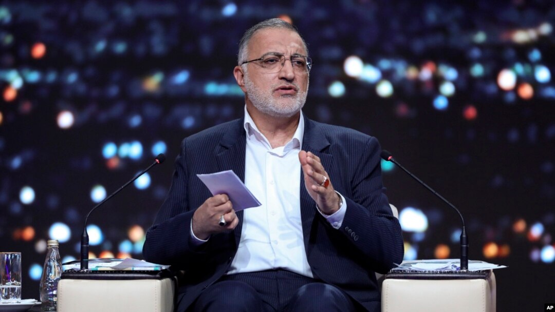 Presidential candidate Alireza Zakani, who is Tehran mayor, speaks in a debate of the candidates at the TV studio in Tehran, Iran, June 17, 2024, in this picture made available by Iranian state-run TV, IRIB.