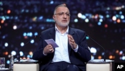 Presidential candidate Alireza Zakani, who is Tehran mayor, speaks in a debate of the candidates at the TV studio in Tehran, Iran, June 17, 2024, in this picture made available by Iranian state-run TV, IRIB.