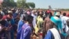 Sudanese refugees welcome UHCR chief Filippo Grandi at Jamjang camp in South Sudan