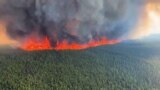 This June 8, 2023, still image from a video by British Columbia Wildfire Service shows an aerial view of the West Kiskatinaw River wildfire located 10 kilometers east of Tumbler Ridge, Canada. (AFP/BC Wildfire Service/Handout)
