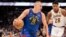 Centar Denvera Nikola Jokić u duelu sa košarkašem Lejkersa Ruijem Hačimurom (Foto: Reuters/Andrew Wevers-USA TODAY Sports)