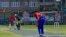 Batsman intends to play an aggressive shot at a sports ground in the Redpora area of Srinagar on the Indian side of Kashmir. (Wasim Nabi/VOA) 