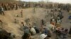 FILE - Miners dig for diamonds in Marange, eastern Zimbabwe, Nov. 1, 2006. 