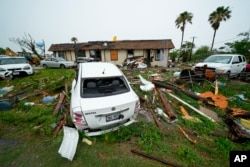 FILE - Damage is seen after a tornado hit in Port Isabel, Texas, Saturday, May 13, 2023. (AP Photo/Julio Cortez, File)