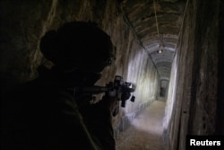 An Israeli soldier secures a tunnel underneath Al Shifa Hospital in the northern Gaza Strip, Nov. 22, 2023. The photo was part of Reuters' Pulitzer Prize-winning breaking news coverage of the Israel-Hamas war.