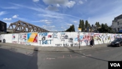 A wall covered in graffiti is seen in London, Aug. 7, 2023.