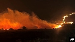 This photo provided by the Oregon Department of Transportation shows the Durkee Fire burning in eastern Oregon, July 22, 2024. 