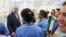 Britain's King Charles meets with staff members during a visit to the University College Hospital Macmillan Cancer Centre in London, Britain, April 30, 2024.