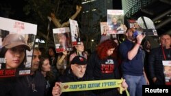 People protest following an announcement by Israel's military that soldiers had mistakenly killed three Israeli hostages being held in Gaza by Palestinian Islamist group Hamas, in Tel Aviv, Israel, Dec. 15, 2023.