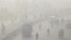 FILE - Vehicles move amid dense smog in Lahore, Pakistan, Nov. 24, 2021. According to a report published, March 14, 2023, by IQAir, a Swiss maker of air purifiers, Lahore has become the city with the worst air in the world in 2022.