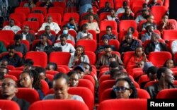 FILE - Delegates attend the preparation of the launch of Kenya's first operational 3U Earth observation satellite, the Taifa-1, at the University of Nairobi's Taifa Hall, in Nairobi, Kenya, April 11, 2023.