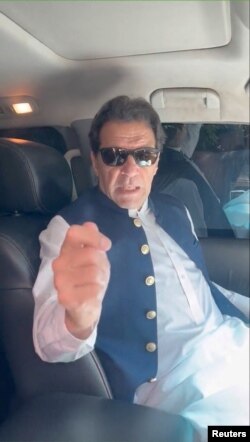 Former Pakistan Prime Minister Imran Khan gestures in a video statement, at an unknown location in Pakistan, in this screen grab obtained from a social media video released May 9, 2023. (Imran Khan via Twitter/via Reuters)