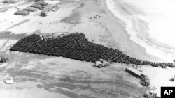 FILE - More than 1,000 sealed barrels containing radioactive soil near Palomares in Spain on March 18, 1966, where H-bombs fell and broke open. The soil is to be taken to the U.S., atomic energy commission's 'Burial Ground' near Aiken, South Carolina, for disposition.