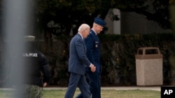 President Joe Biden arrives at Walter Reed National Military Medical Center in Bethesda, Md., Feb. 16, 2023, for his annual health exam. While declaring the president healthy, the examining physician noted “the President's gait remains stiff, but has not worsened since last year.”