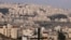 FILE - A picture taken from the Palestinian biblical city of Bethlehem shows a view of the Israeli settlement of Har Homa, in the occupied West Bank, on Dec. 7, 2023. 