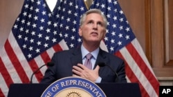 FILE - Rep. Kevin McCarthy, R-Calif., speaks to reporters hours after he was ousted as Speaker of the House, Oct. 3, 2023, at the Capitol in Washington.