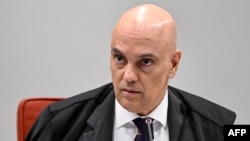 FILE - The Supreme Court Judge Alexandre de Moraes listens during a session in Brasilia, Brazil, June 18, 2024.