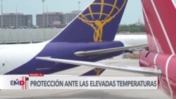 Trabajadores del aeropuerto de Miami buscan protegerse de las temperaturas elevadas