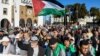 Moroccans wave Palestinian flags during a protest in Rabat on Dec. 24, 2023 in solidarity with Gaza amid the ongoing conflict between Israel and the Palestinian militant group Hamas.