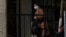 FILE - Bolivia's former interim President Jeanine Anez walks to her sentencing at the Miraflores women's jail, in La Paz, June 15, 2022.