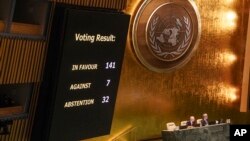 Monitors show results of a United Nations General Assembly vote for a U.N. resolution supporting Ukraine after Russia's invasion, Feb. 23, 2023 at U.N. headquarters.