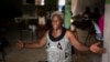 Philomene Dayiti, 65, speaks about her experience of having to flee her home when gang violence began and about living in a camp for internally displaced people at a local church in the Delmas district of Port-Au-Prince, Haiti, June 11, 2024.