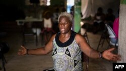 Philomene Dayiti, 65, speaks about her experience of having to flee her home when gang violence began and about living in a camp for internally displaced people at a local church in the Delmas district of Port-Au-Prince, Haiti, June 11, 2024.