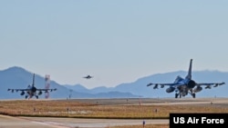 Two U.S. Air Force F-16 Fighting Falcons taxi as a Republic of Korea Air Force F-16 passes by during the fiscal year 2023 training event at Kunsan Air Base, Nov. 2, 2022. The U.S. Air Force will host Vigilant Defense 24, this fiscal year’s combined event, Oct. 30 – Nov. 3, 2023. 