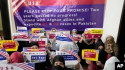FILE — Afghan refugees in Islamabad, July 21, 2023. A group of former U.S. diplomats and resettlement organization representatives have asked Pakistan not to deport Afghans waiting for U.S. visas under a program that relocates at-risk Afghan refugees fleeing Taliban rule. 