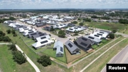 A drone image shows 3D-printed homes in the Wolf Ranch community in Georgetown, Texas, June 27, 2024.